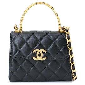Borsa a mano Chanel Matelasse Chain Clutch in pelle d'agnello nera