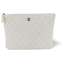 Chanel Classic O Case Quilted Caviar Small