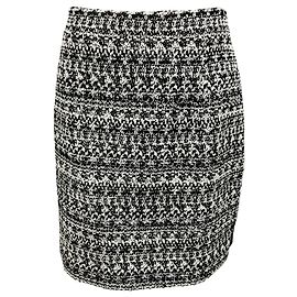 Minifalda de tweed con lentejuelas negro / blanco Alessandra Rich