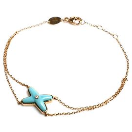Pulsera Chaumet de oro rosa con dijes