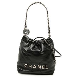 Borsa Chanel 22 Mini in vitello lucido nero