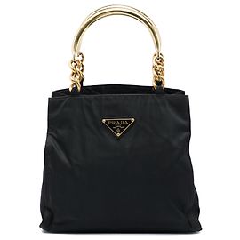 Borsa Prada in Tessuto nera con manico in metallo