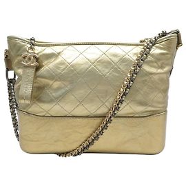 BOLSO DE MANO CHANEL GABRIELLE MEDIUM A93824Y CUERO DORADO BANDOLERA