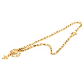 Collar con colgante de cruz Chanel CC chapado en oro