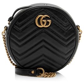 Borsa a tracolla mini rotonda GG Marmont in pelle matelassé Gucci