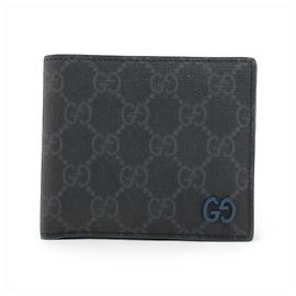Portafoglio bi-fold Gucci GG Supreme in pelle