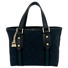 Mini borsa tote GUCCI in pelle e tela con motivo GG Logo