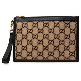 Clutch Gucci in lana beige GG