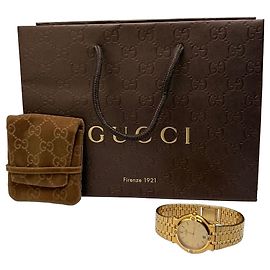 Reloj de pulsera Vintage Gucci de acero inoxidable dorado, esfera beige