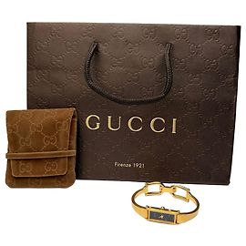 Relógio de pulseira Gucci Vintage tom dourado mostrador preto
