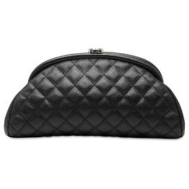 Bolso de mano Chanel Timeless Kisslock de piel caviar acolchada negra