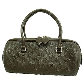 Louis Vuitton Monogram Revelation Papillon PM Handtasche