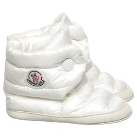 Botas para bebé Moncler em pele e penugem - Creme