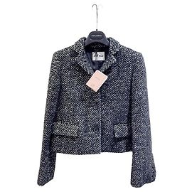 Chaqueta Miu Miu de tweed azul marino