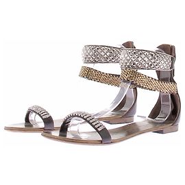 Giuseppe Zanotti Sandalias doradas con pulsera plateada