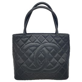 Bolso Tote Chanel de piel de becerro granulada negra