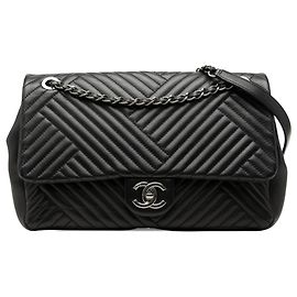 Chanel Black Large Lambskin CC Crossing Flap