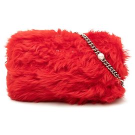 Borsa crossbody Miu Miu in shearling rosso con catena di perle