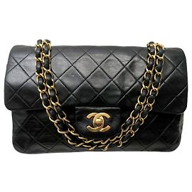 BORSA A MANO VINTAGE CHANEL CLASSIQUE TIMELESS 11.12 IN PELLE NERA MATELASSÉ