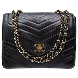 BORSA A MANO VINTAGE CHANEL CLASSIQUE TIMELESS IN PELLE NERA CHEVRON