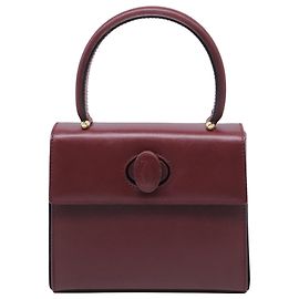 Must De Cartier Handtasche mit oberem Griff aus burgunderrotem Leder