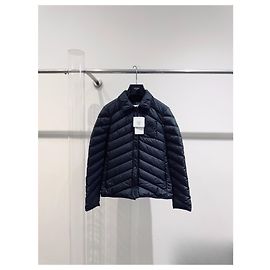 Hermès Daunenjacke Schwarz aus Polyester Größe 36