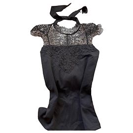 Autre Marque Top de encaje negro con cuello alto