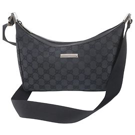 Bolsa de Ombro Gucci GG Canvas 019 0433 em Couro