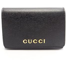 Tarjetero Gucci de piel negra