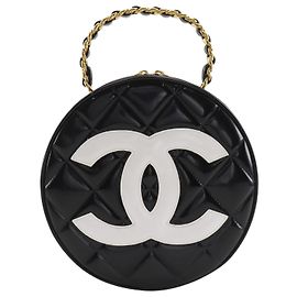 Borsa Vanity rotonda in pelle verniciata matelassé nera Chanel CC