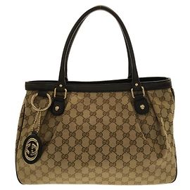 Borsa a mano Gucci in tela GG beige