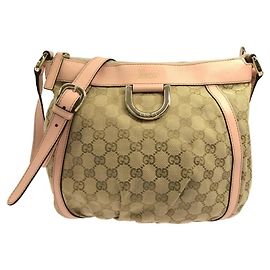 Borsa a tracolla Gucci in tela GG beige e marrone