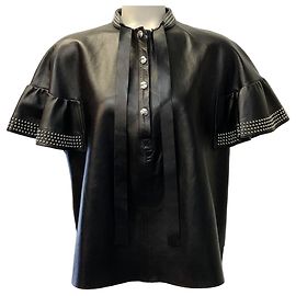 Top de manga corta de piel negra con tachuelas plateadas RED Valentino