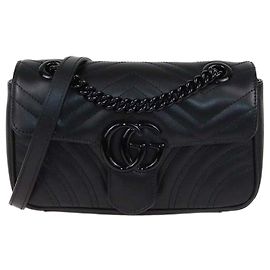 Gucci Mini GG Marmont Schultertasche aus schwarzem Matelassé-Leder