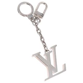 LOUIS VUITTON Porte Cre Printed Initials LV Charm Metal M65071 LV Auth 203696V