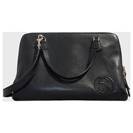 Borsa tote Gucci in pelle martellata nera con logo GG