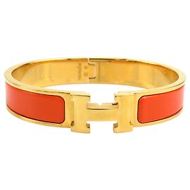 Bracelete Clic H PM estreito em esmalte dourado Hermès