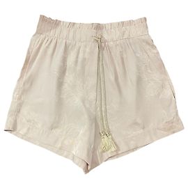 Short Nanushka beige T.S