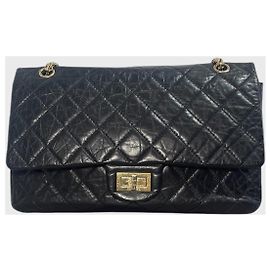 Chanel 2.55 Tasche aus schwarzem gestepptem Leder