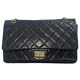 Chanel 2.55 Tasche aus schwarzem gestepptem Leder