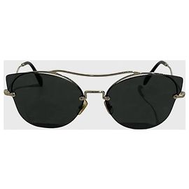 Gafas Miu Miu doradas