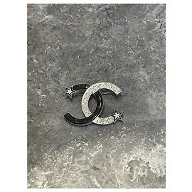 Broche Chanel noire et argent