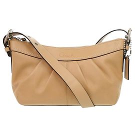 Bolsa de ombro Coach em couro marrom