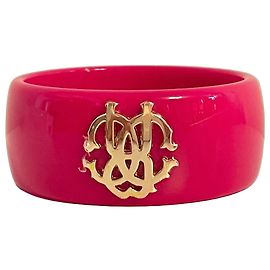 Bracciale Bangle Roberto Cavalli in resina fucsia con logo dorato