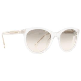 CHANEL - Lunettes de soleil Chanel en acétate transparente et paillettes argentées