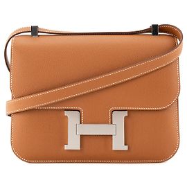 HERMÈS - Sac à bandoulière Constance 24 Hermès en cuir de veau espom gold