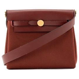 HERMÈS - Sac à bandoulière Herbag Mini Hermès en cuir lisse et toile rouge H