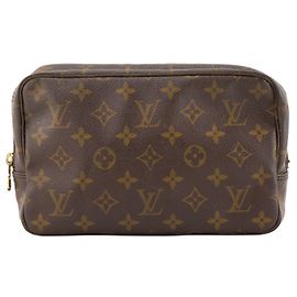 LOUIS VUITTON - Neceser PM Louis Vuitton en toile enduite monogrammée vintage