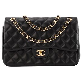 CHANEL - Bolso de bandolera Classique/Timeless Jumbo Chanel en piel lisa negra