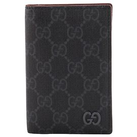 GUCCI - Porta carte Long GG Gucci in tela rivestita monogrammata nera e grigia